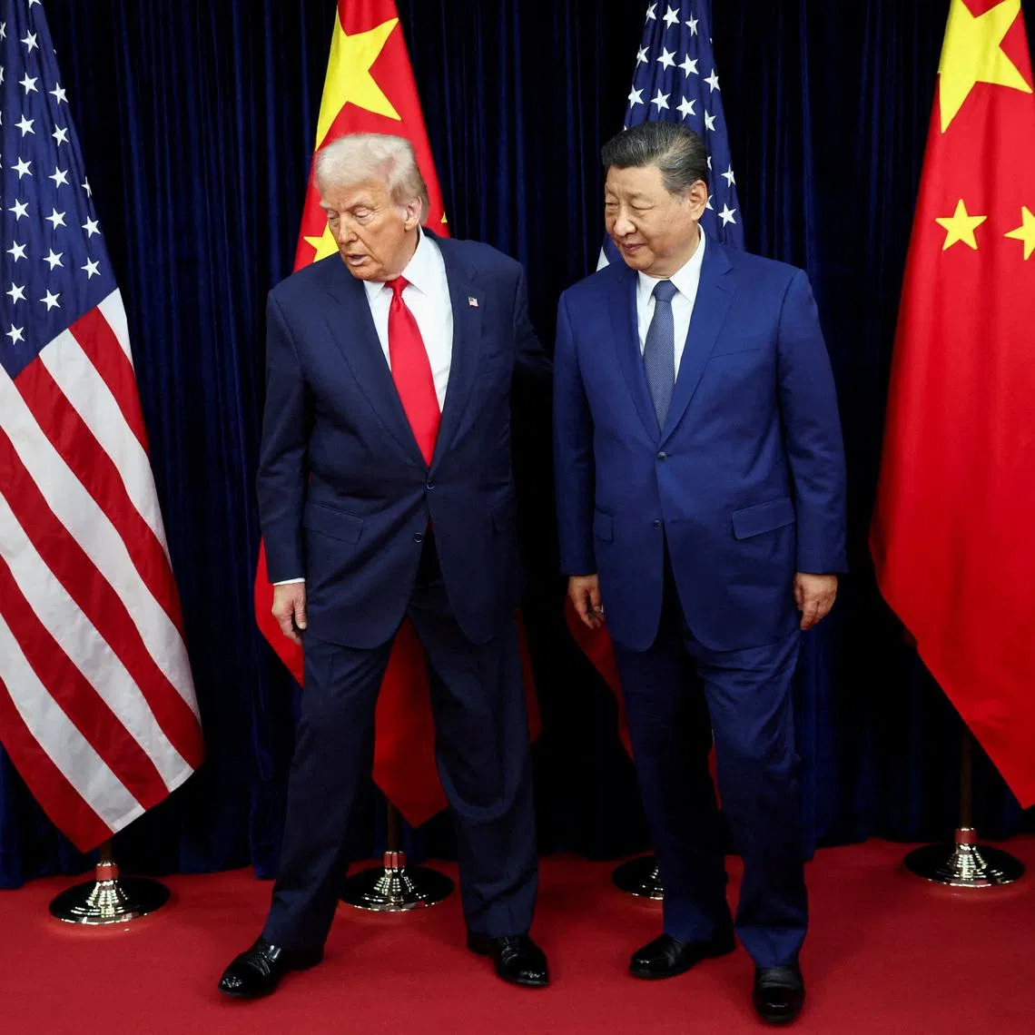 US President Donald Trump and Chinese President Xi Jinping on the sidelines of the Apec summit in Busan, on Oct 30, 2025. 