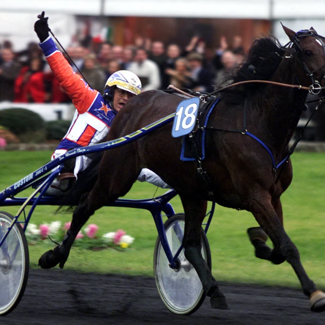 FILE PHOTO: Italian driver Gianpolo Minnucci and Italian horse Varenne speed to the finish line to win Minnucci's second Prix d'Amerique in a row, at Vincennes horse track outside Paris January 27, 2002. General du Pommeau finished second and Insert Gede came third. REUTERS/Charles Platiau  CP/CRB/File Photo