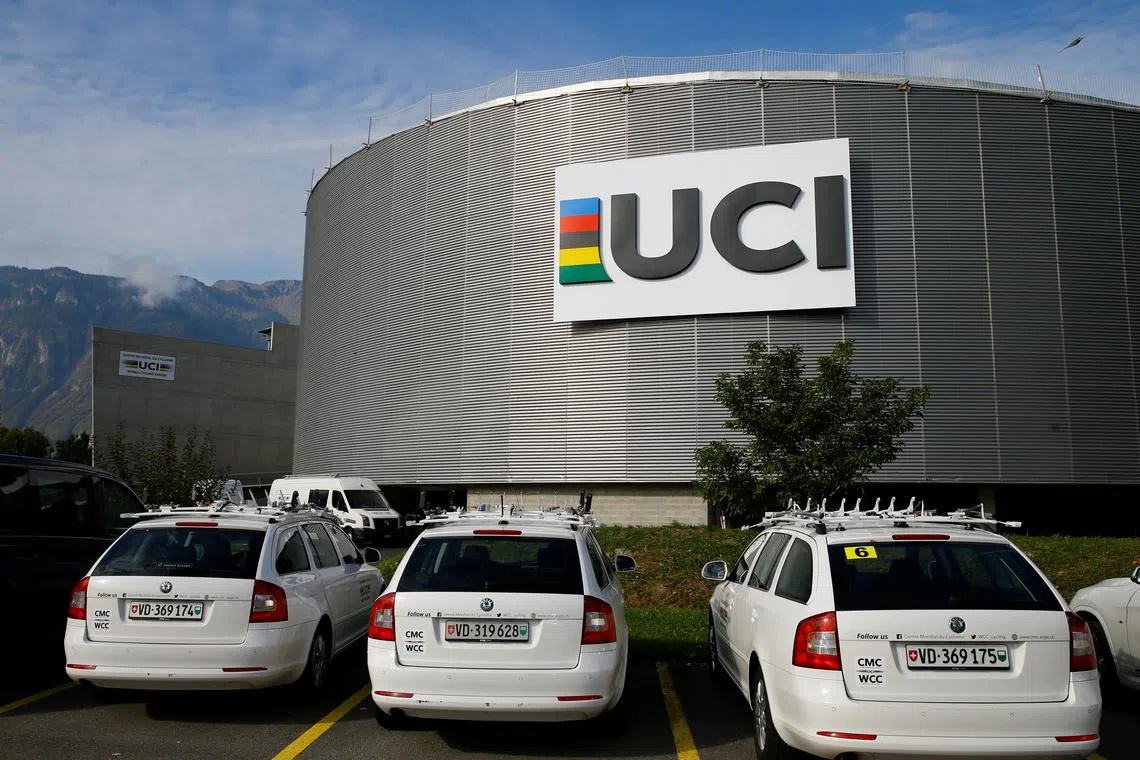 FILE PHOTO: A logo is pictured on the indoor track at the International Cycling Union (UCI) Federation headquarters in Aigle, Switzerland, September 27, 2017.  REUTERS/Denis Balibouse/File Photo