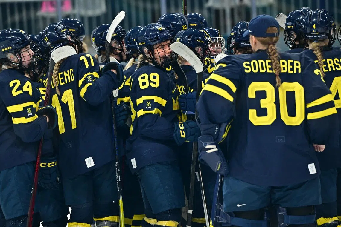 Ice hockey-Germany beat Italy and Sweden stay perfect