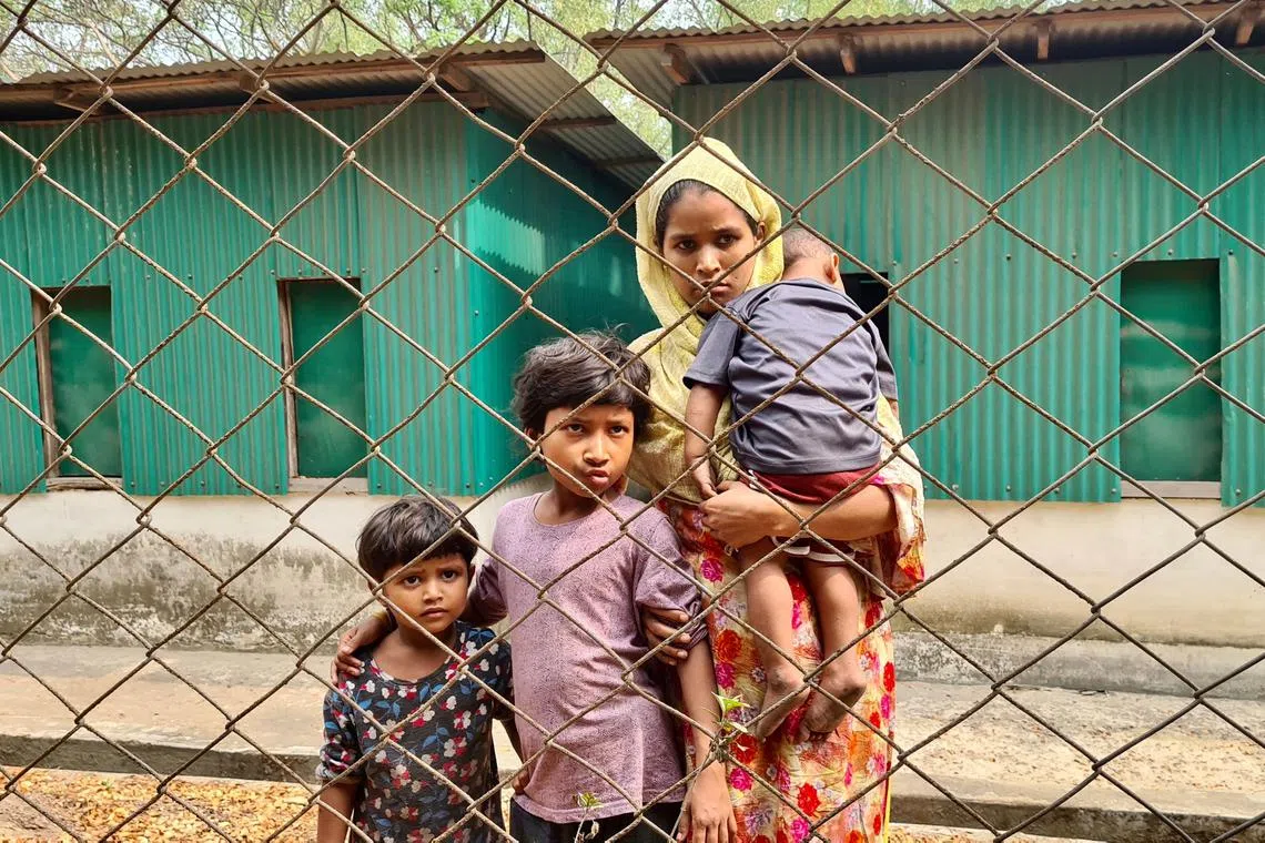 A Rohingya family arrives for a meeting with the Myanmar officials in Teknaf, on March 15, 2023.