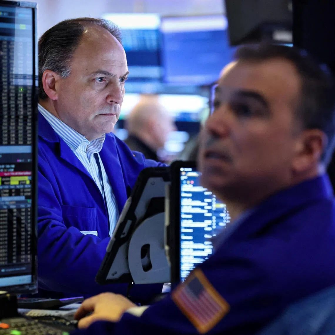 Traders working on the floor of the New York Stock Exchange, in New York City, on Jan 21.