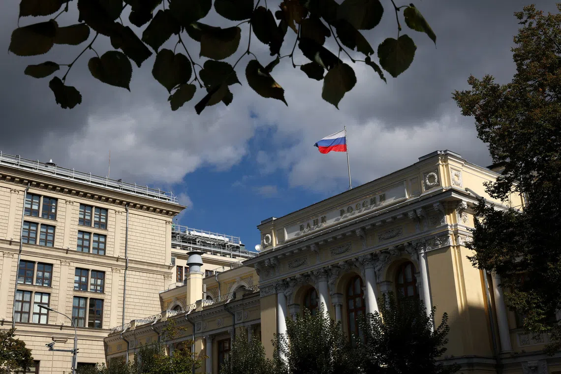 A flag flies above the headquarters of the Russian Central Bank on the day of a meeting, held to set its benchmark interest rate, in Moscow, Russia, September 12, 2025. REUTERS/Ramil Sitdikov