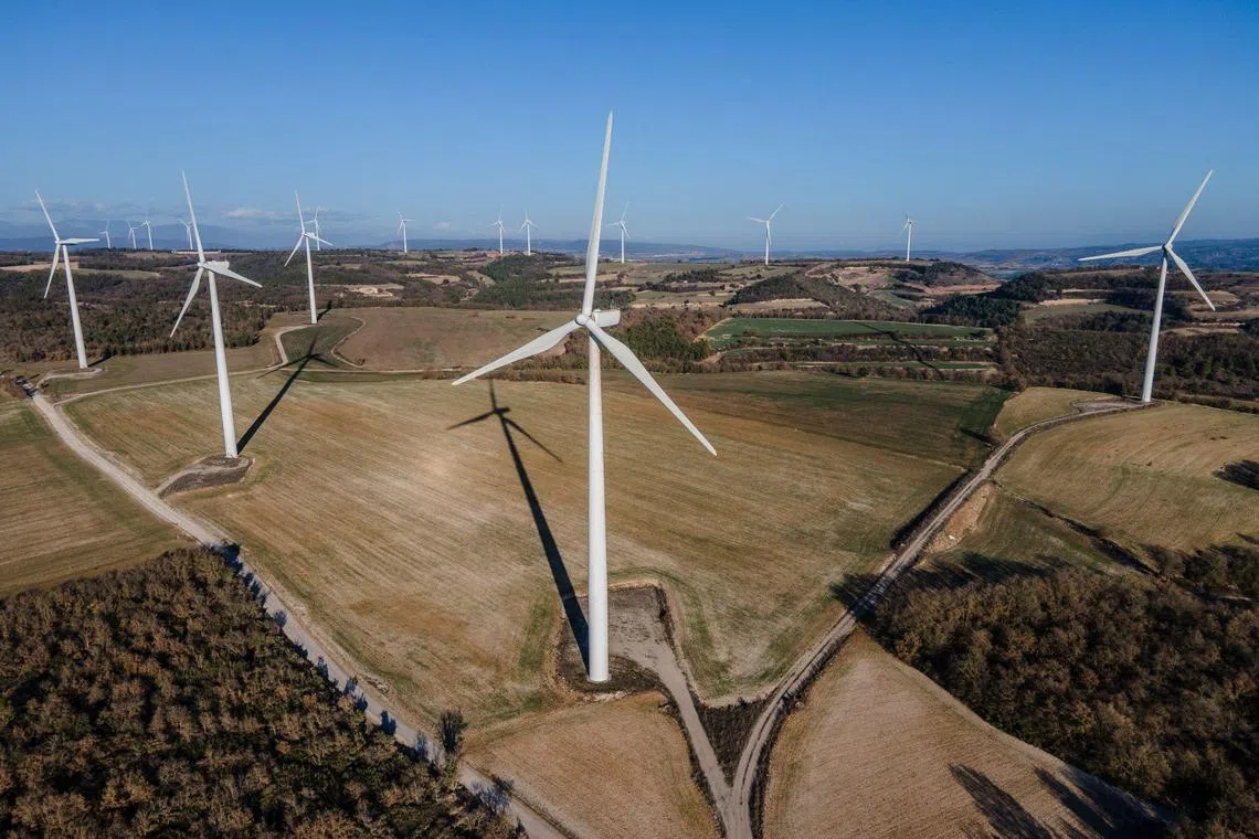 Wind turbines at the Pujalt wind farm, operated by Parque Eolico Pujalt S.L., in the Anoia region of Catalonia, Spain, on Tuesday, Dec. 27, 2022. Spain aims to get almost three-quarters of its electricity from renewables by the end of the decade, up from about 47% last year. Photographer: Angel Garcia/Bloomberg
