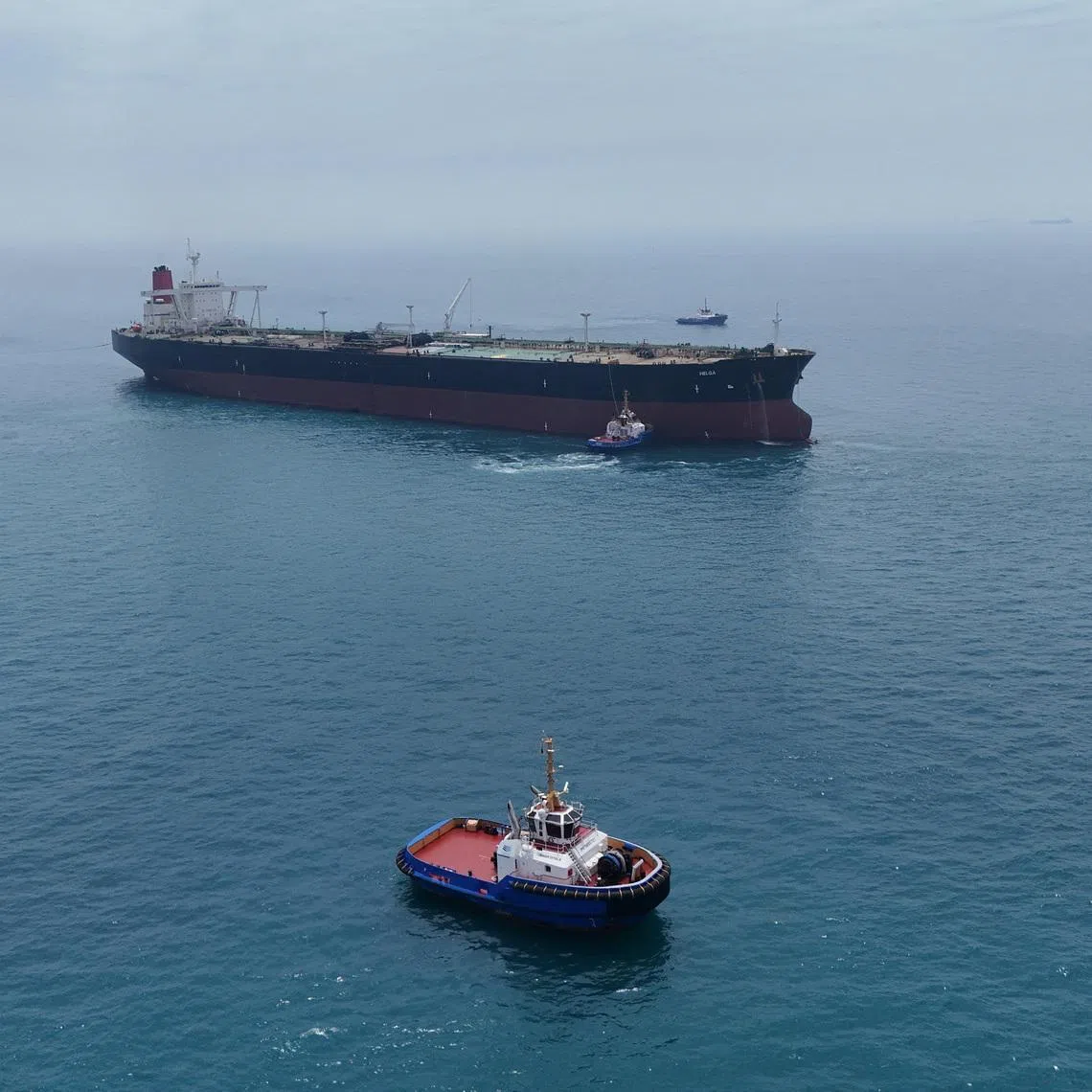 Drone view of oil tanker HELGA berthed at one of Iraq's southern offshore oil terminals near Basra as it prepares to load crude oil, becoming the second vessel to arrive since the closure of the Strait of Hormuz, April 24, 2026. REUTERS/Mohammed Aty