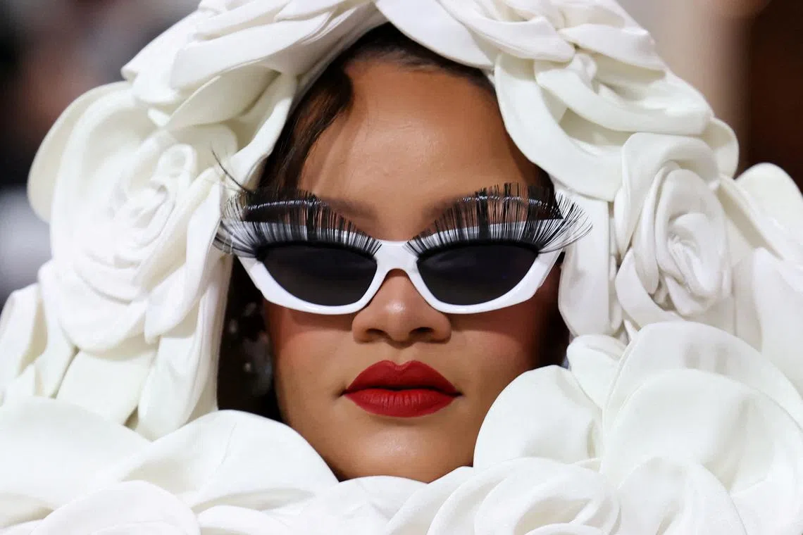 Rihanna posing at the Met Gala, an annual fundraising gala held for the benefit of the Metropolitan Museum of Art's Costume Institute with this year's theme "Karl Lagerfeld: A Line of Beauty", in New York City, New York, U.S., May 1, 2023.