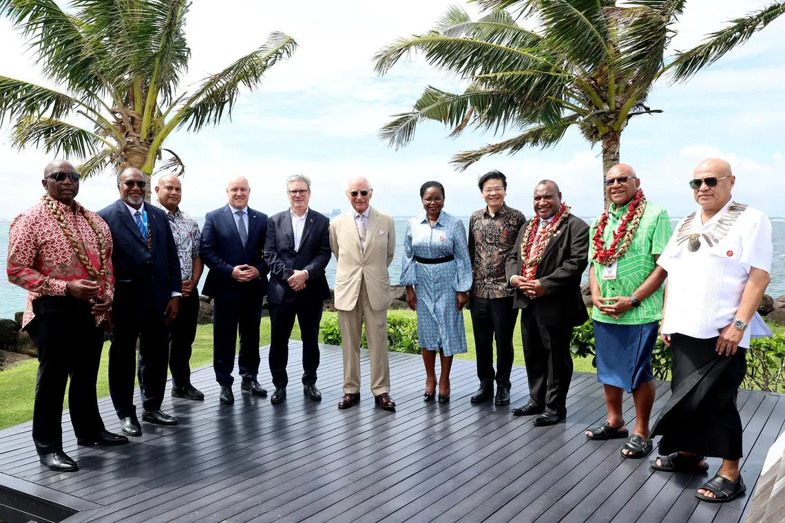 APIA, SAMOA - OCTOBER 25: King Charles III poses with new Heads of Government from across the Commonwealth at the New Heads of Government Reception at Taumeasina Island Resort on October 25, 2024 in Apia, Samoa. The King's visit to Australia is his first as monarch, and the Commonwealth Heads of Government Meeting (CHOGM) in Samoa will be his first as head of the Commonwealth.     Chris Jackson/Pool via REUTERS