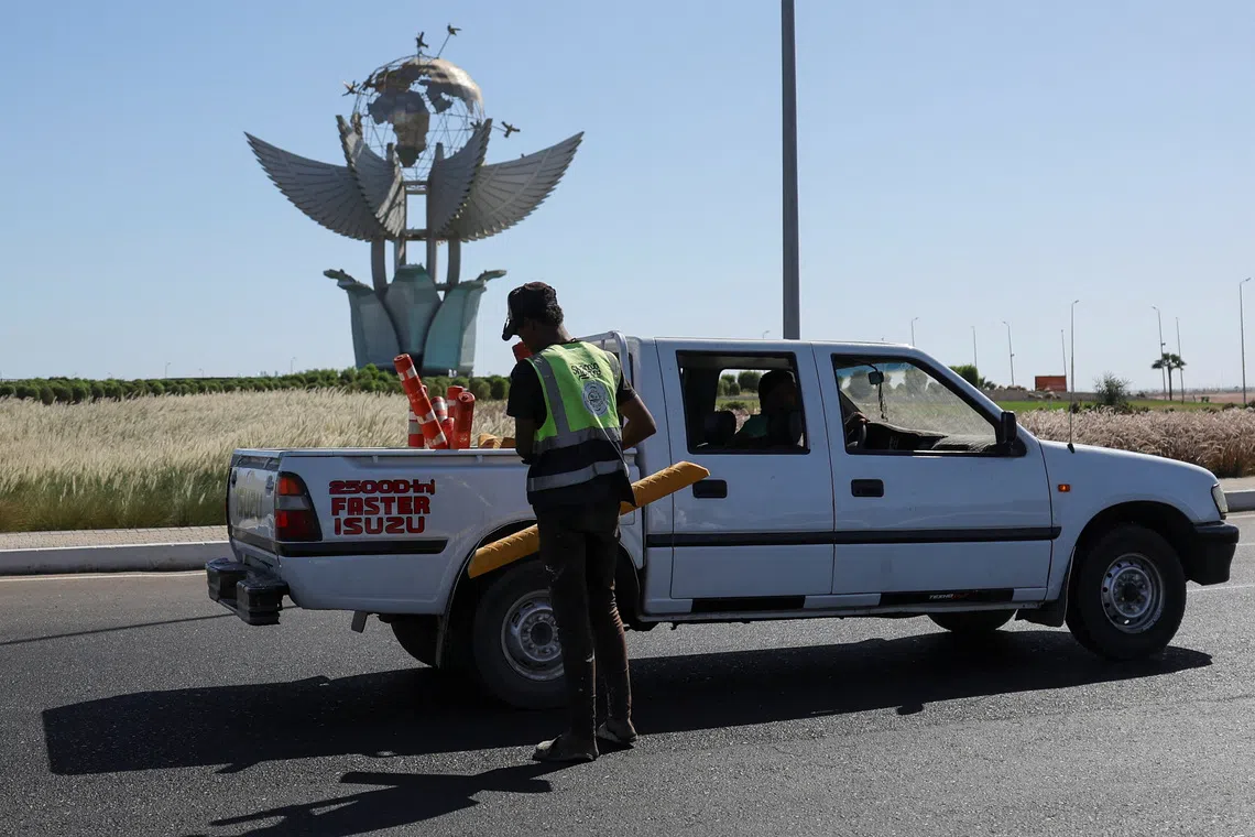 A municipal employee stops near Peace Square, during preparations for an international summit on Gaza, amid a ceasefire between Israel and Hamas, at the Red Sea resort of Sharm el-Sheikh, Egypt, October 11, 2025. REUTERS/Amr Abdallah Dalsh