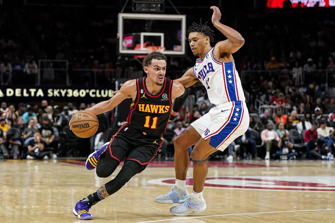 Atlanta Hawks star Trae Young (left) has traditionally struggled against the Miami Heat and he knows he will have to do more in their play-in clash.