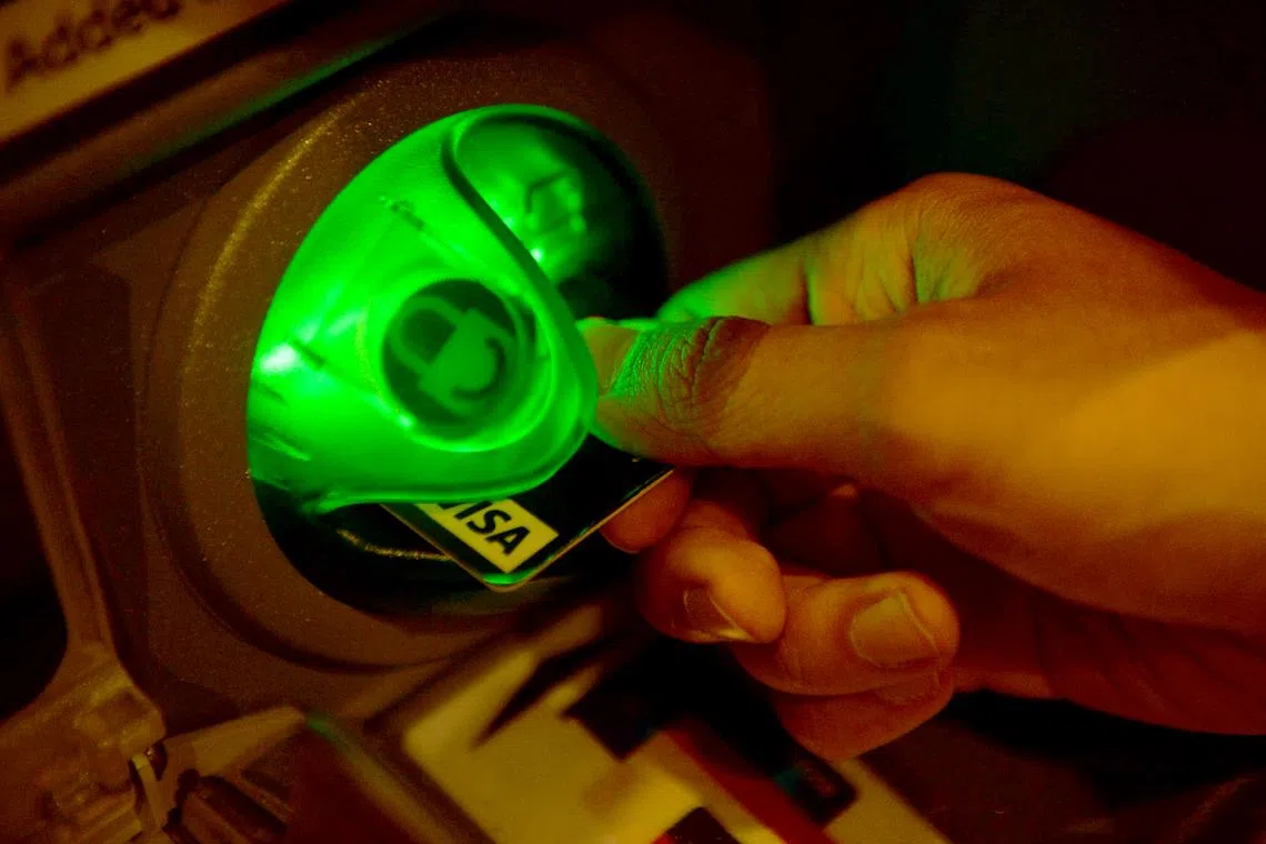 Forty-seven of the 128 people are believed to be runners who had helped unlicensed moneylending businesses carry out ATM transfers.