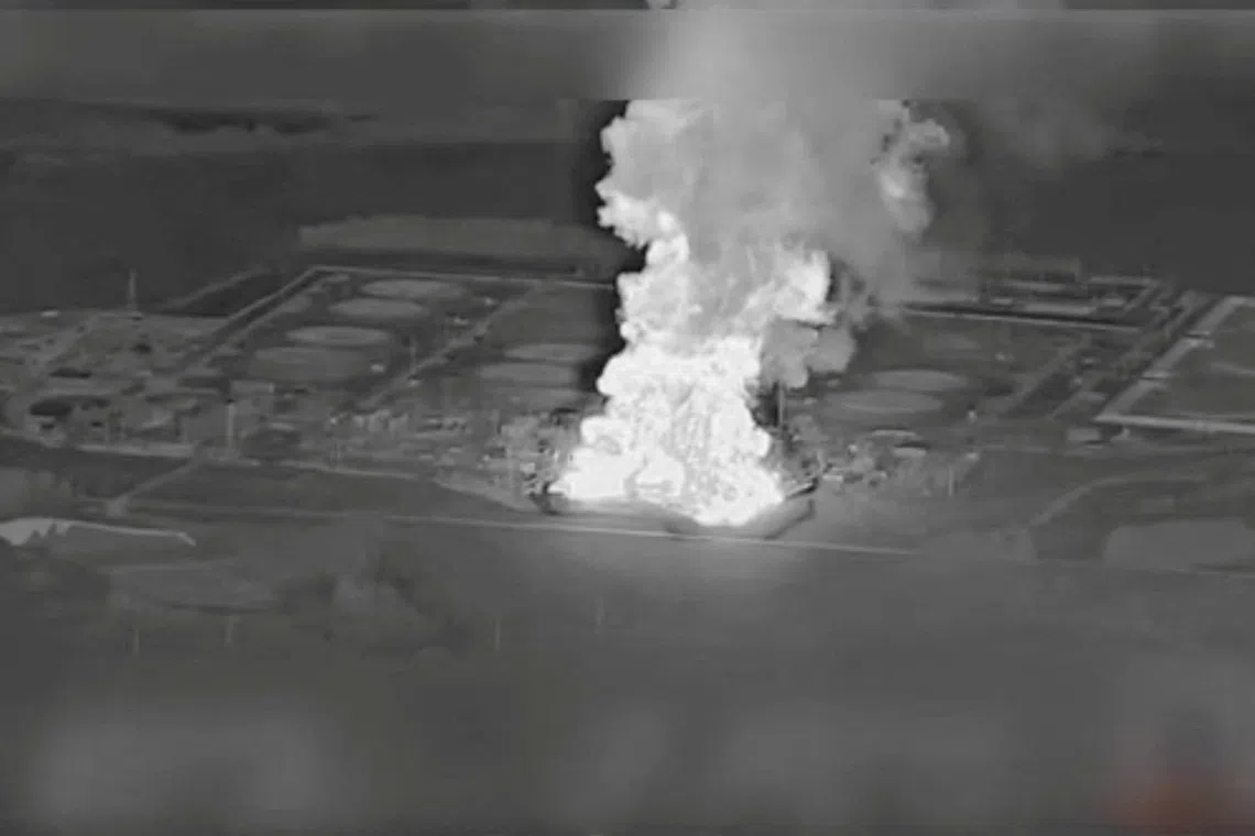 FILE PHOTO: Smoke rises from the Unecha oil pumping station during a fire, in Unechsky district, Bryansk region, Russia, August 21, 2025 in this night vision still image obtained from social media video. YouTube @MAGYARBIRDS via REUTERS/File Photo