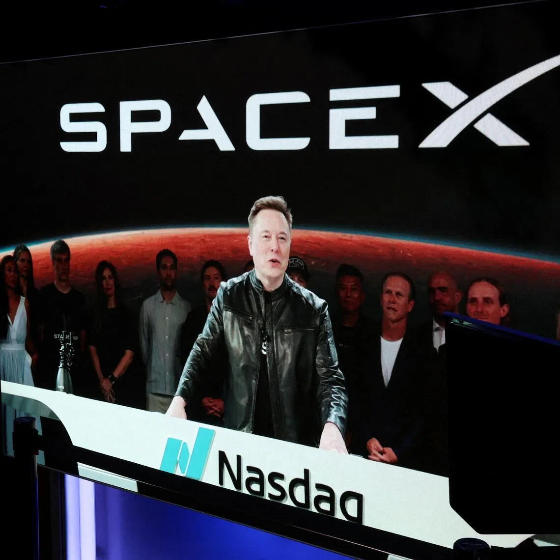 FILE PHOTO: Founder, CEO, Chairman and Chief Engineer of SpaceX, Elon Musk, speaks via videolink on the day of SpaceX's initial public offering (IPO) at the Nasdaq MarketSite in New York City, U.S., June 12, 2026. REUTERS/Brendan McDermid/File Photo