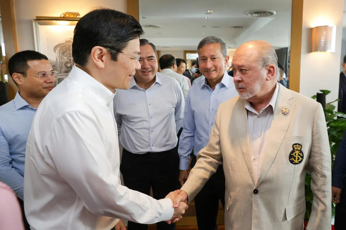 DPM Lawrence Wong meeting Malaysia’s King, Sultan Ibrahim Iskandar, on May 7. With them are (background, from left) National Development Minister Desmond Lee, Malaysian Transport Minister Anthony Loke and Foreign Minister Vivian Balakrishnan.