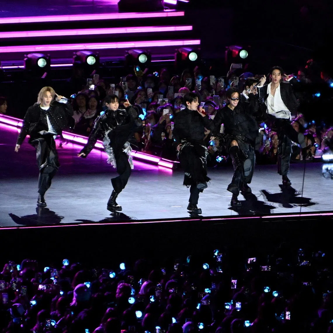 Kpop boy band BTS perform onstage during a comeback concert at Gwanghwamun Square on March 21 in Seoul.