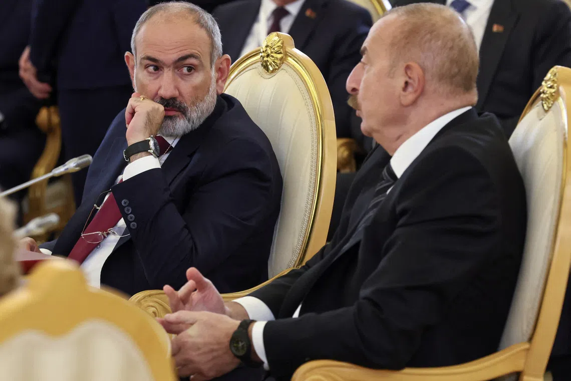 Azerbaijani President Ilham Aliyev and Armenian Prime Minister Nikol Pashinyan attend a summit of leaders of nations, which are members of the Commonwealth of Independent States (CIS), at the Kremlin in Moscow, Russia October 8, 2024. Sergei Ilnitsky/Pool via REUTERS