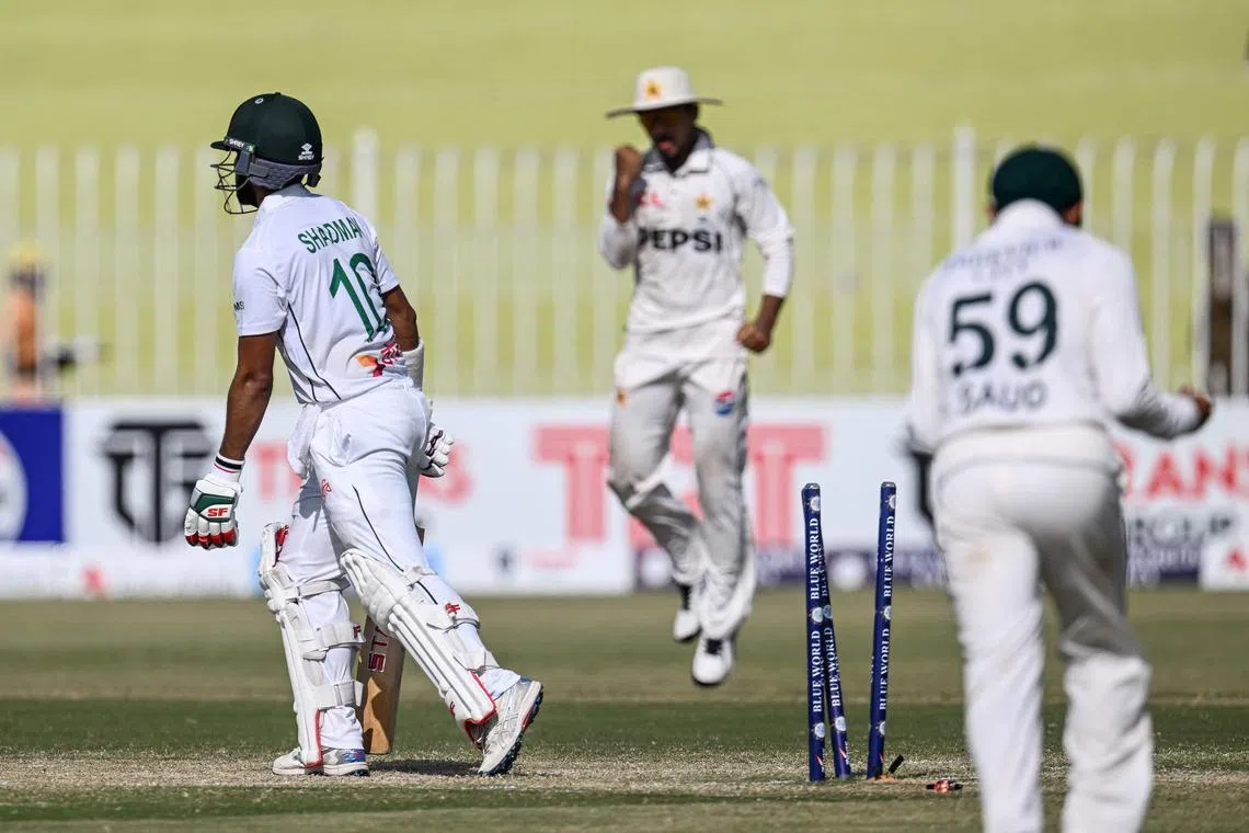 After scoring 93 runs, Bangladesh's Shadman Islam is clean bowled by Pakistan's Mohammad Ali on the third day of the first Test at the Rawalpindi Cricket Stadium on Aug 23, 2024.