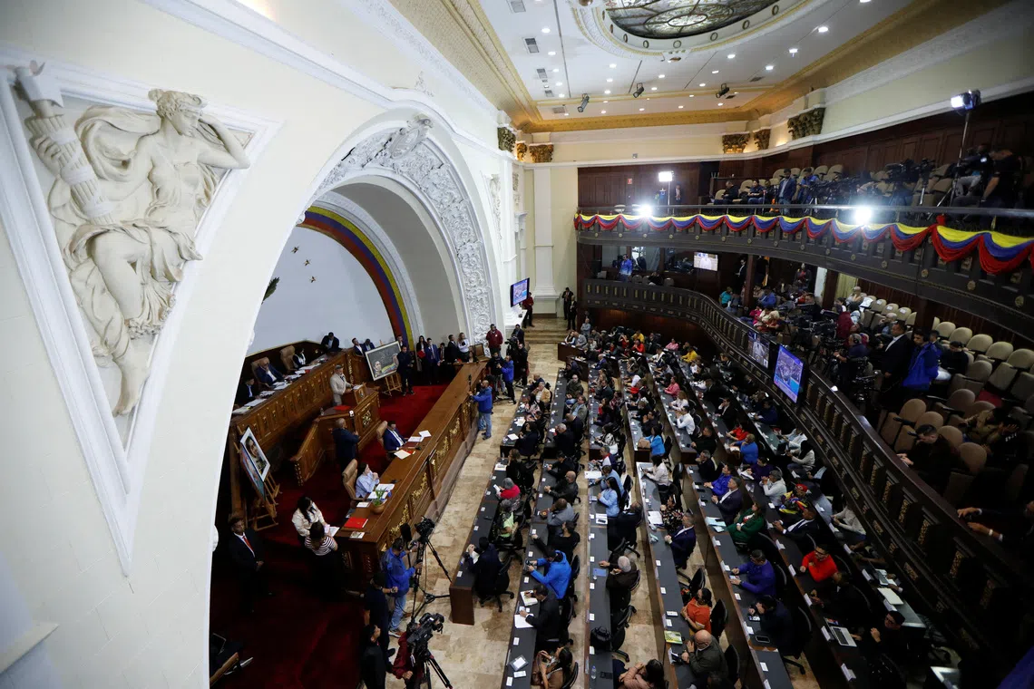 Lawmakers attend an extraordinary session to discuss a bill opposing measures by U.S. President Donald Trump that restrict sanctioned oil tankers from entering and leaving Venezuela, in Caracas, Venezuela, December 22, 2025. REUTERS/Leonardo Fernandez Viloria
