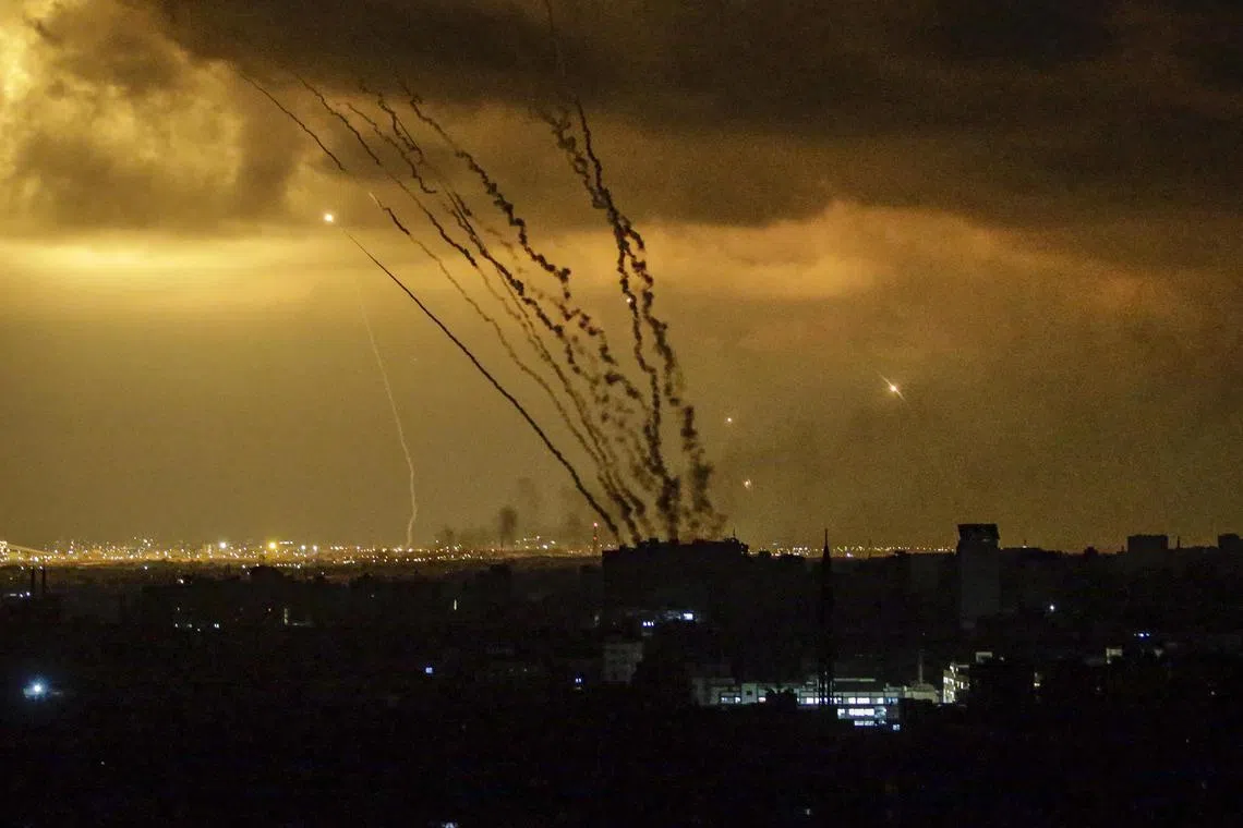 Rockets are launched on Oct 14, 2023, from the coast of the Gaza Strip towards Israel by Hamas militants.
