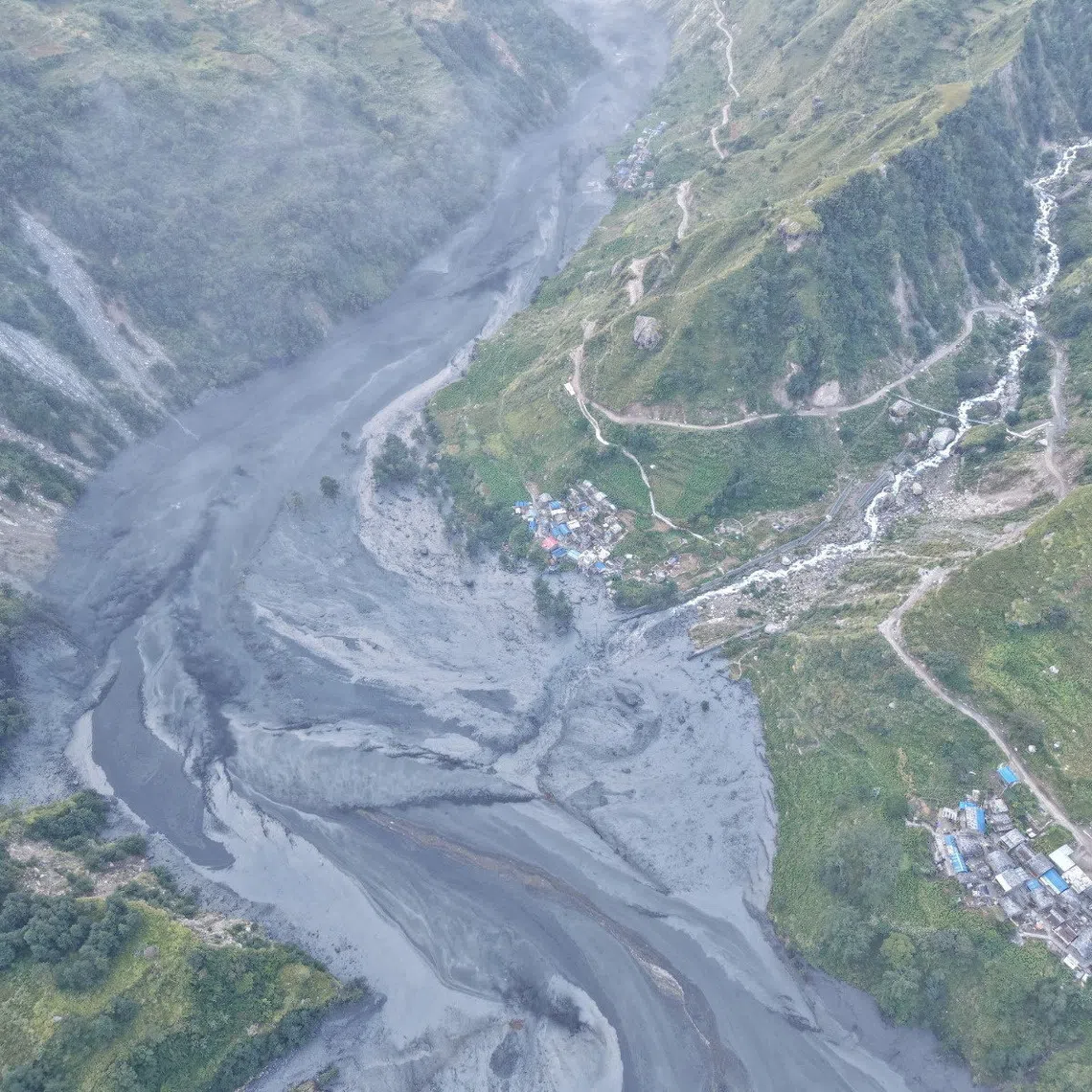 A dry landslide in Chumnubri village in Gorkha district, about 100km west of Kathmandu, blocked the Budhi Gandaki River, leading to downstream flooding.
