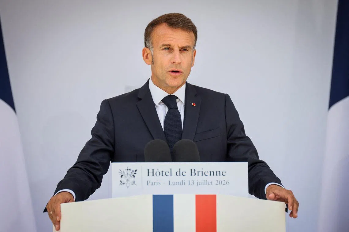 French President Emmanuel Macron delivers his traditional address to the armed forces on the eve of the Bastille Day parade at the Ministry of Defense in Paris, France, July 13, 2026. Thomas Padilla/Pool via REUTERS
