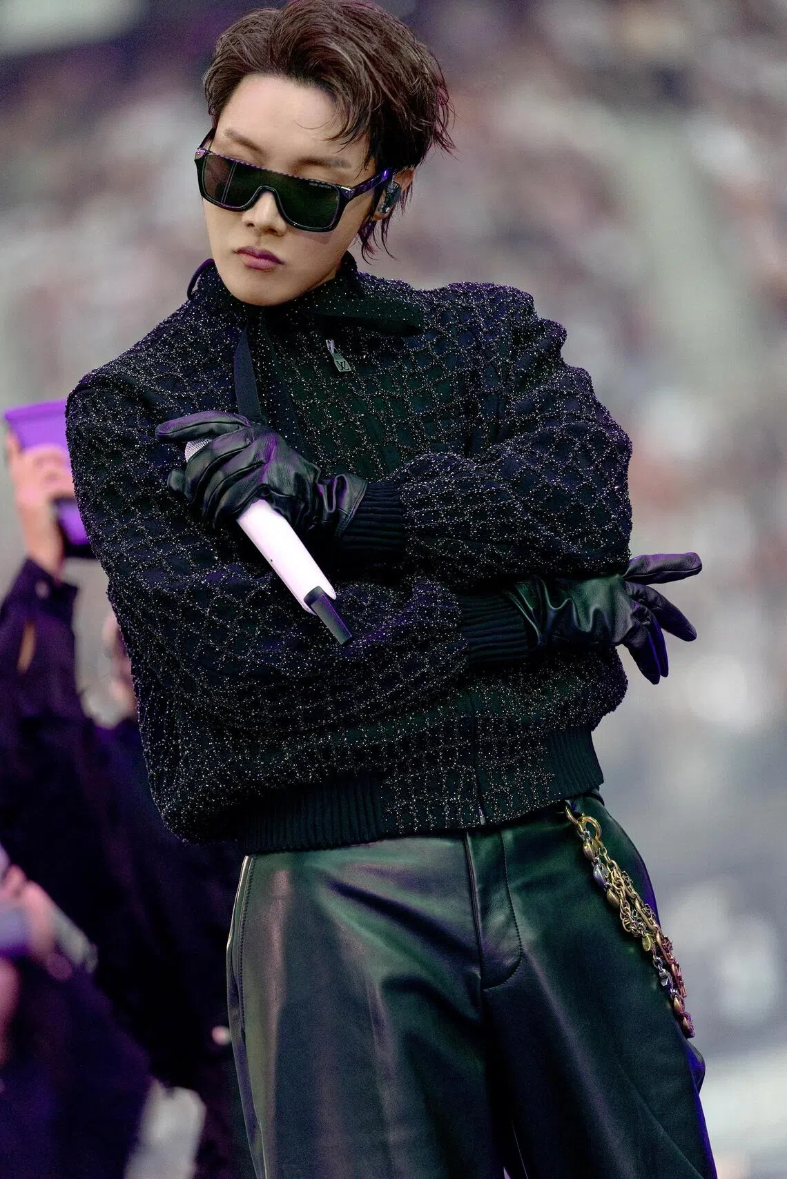 J-hope in a custom Louis Vuitton black Crocodile pattern hand-embroidered jacket.