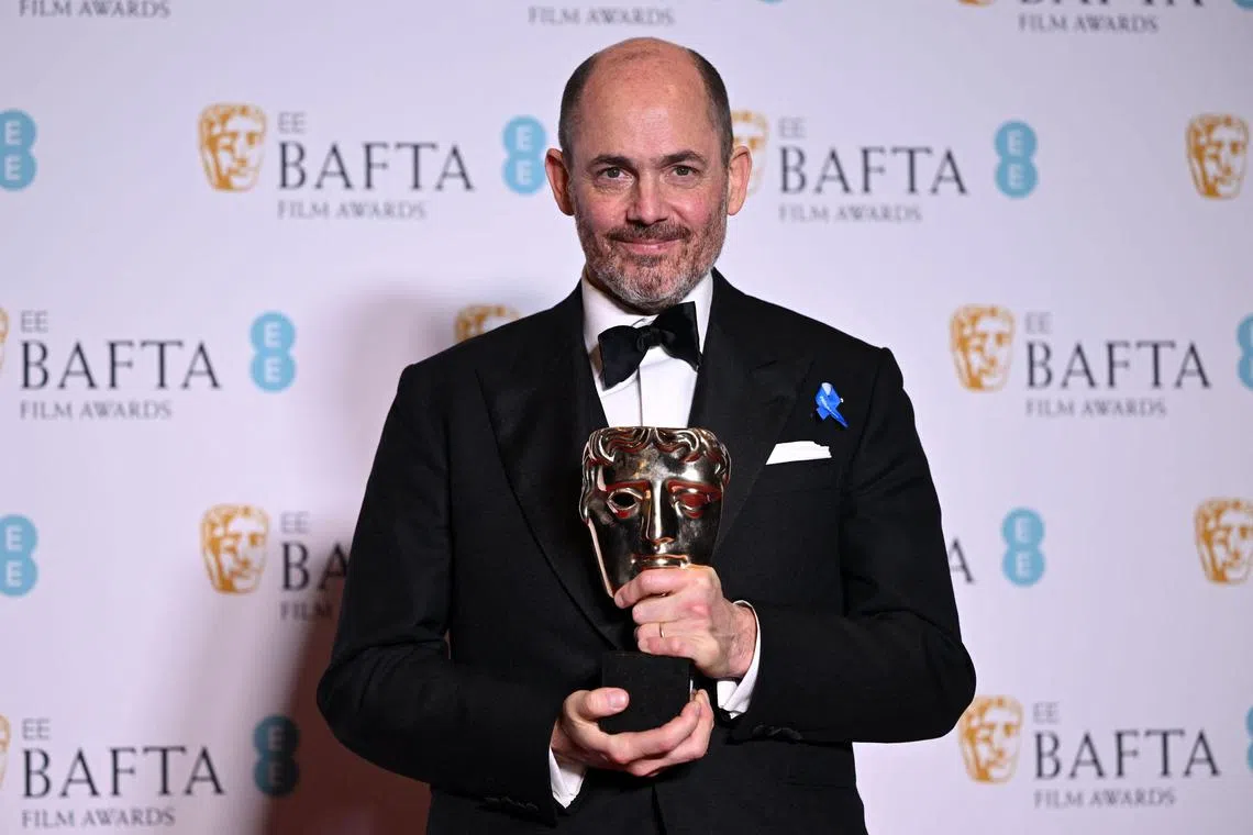 German movie director and screenwriter Edward Berger poses with the award for Best director for All Quiet On The Western Front during the Bafta British Academy Film Awards ceremony at the Royal Festival Hall, Southbank Centre, in London, on Feb 19, 2023.