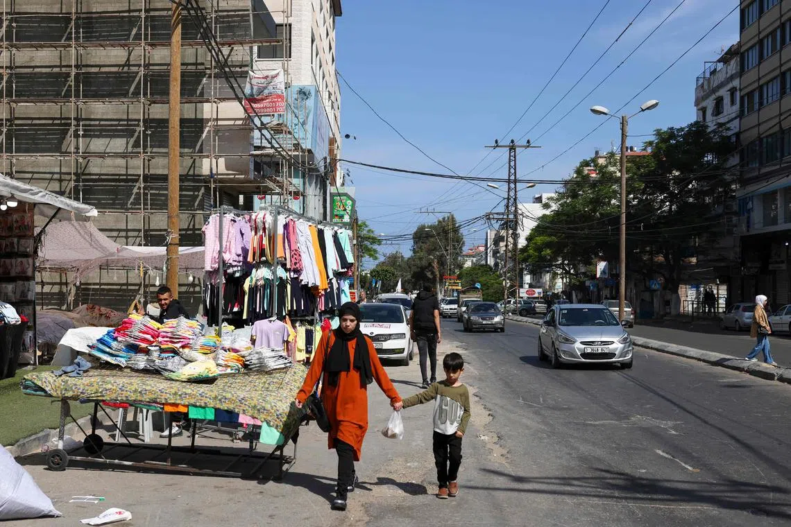 Shops and public offices reopened, and crowds returned to streets that had been deserted for days.