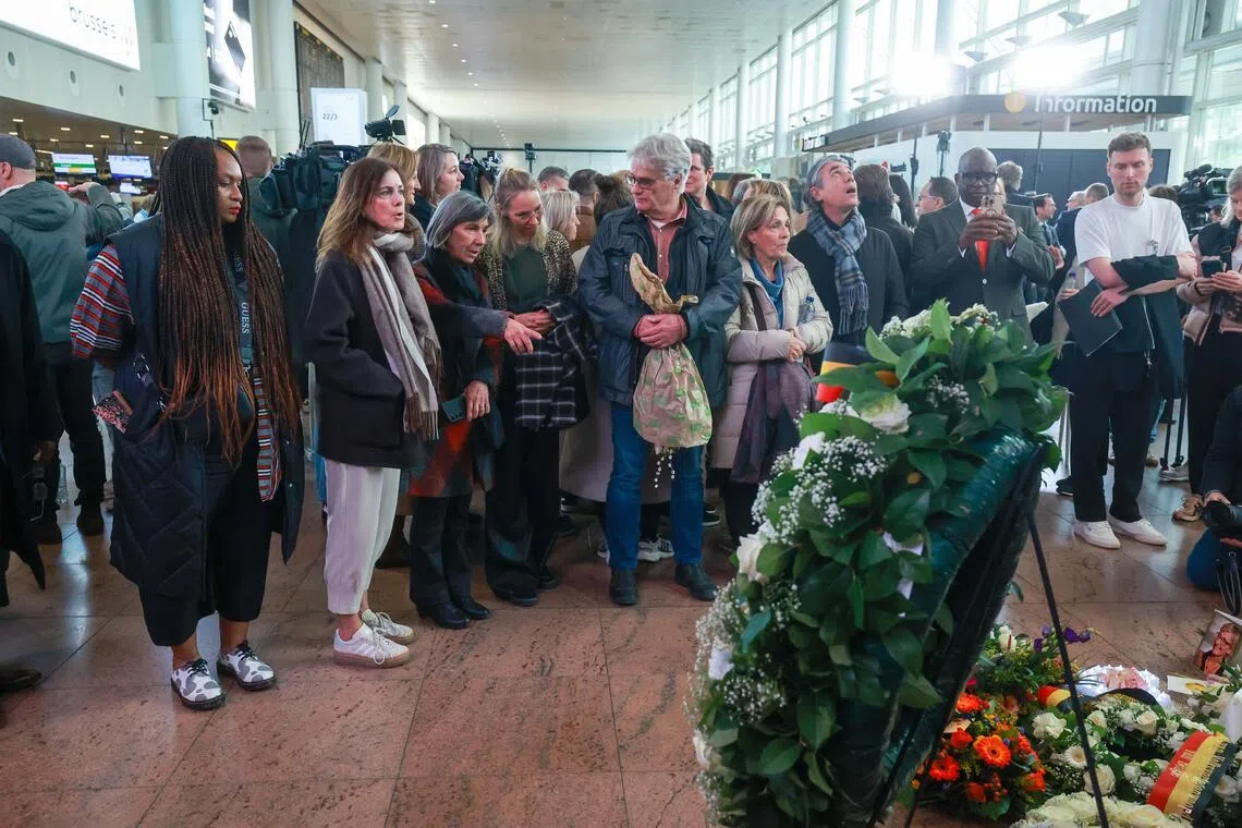 Belgian officials, victims’ families and citizens attending a memorial ceremony on the 10th anniversary of the Brussels attacks at Zaventem Airport in Brussels, Belgium on March 22.