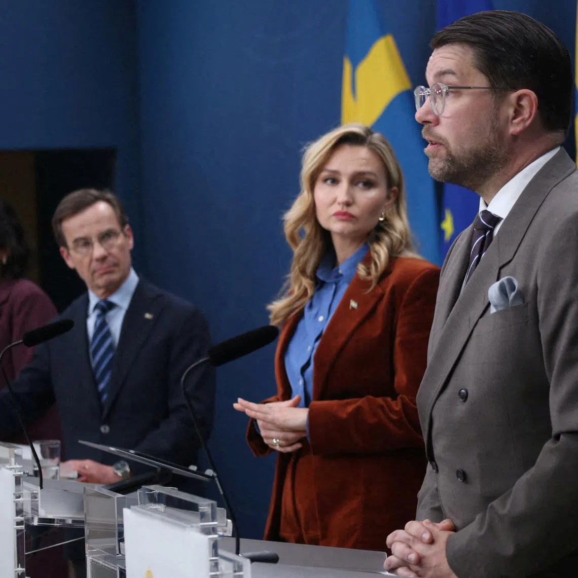 FILE PHOTO: Sweden Democrats Party leader Jimmie Akesson, Minister for Energy, Business and Industry Ebba Busch, Prime Minister Ulf Kristersson and Education and Integration Minister Simona Mohamsson attend a press conference in Stockholm, Sweden, March 6, 2026. REUTERS/Tom Little/File Photo