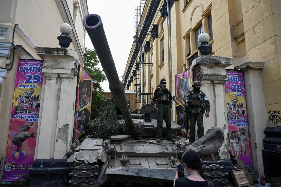 Wagner fighters stand on a tank in the Russian city of Rostov-on-Don, during their brief mutiny.