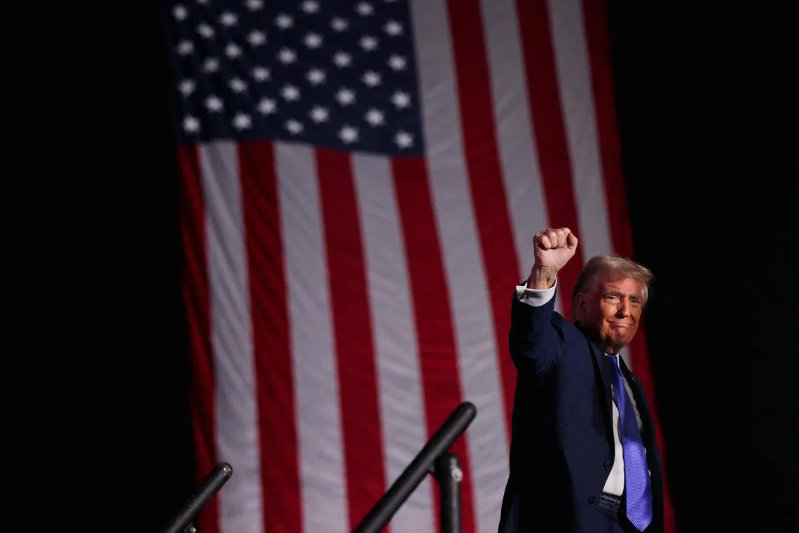 Republican presidential nominee and former U.S. President Donald Trump gestures at the end of his Make America Great Again Rally in Latrobe, Pennsylvania, on Oct 19.
