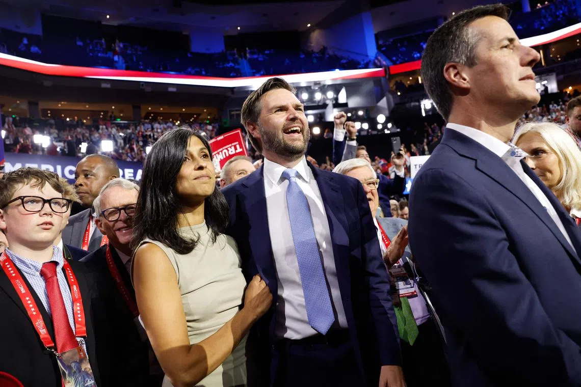 Ohio Senator J.D. Vance and his wife Usha Chilukuri Vance look on as he is nominated on the first day of the Republican National Convention.