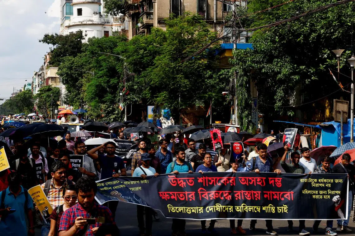 Medics march along a street during a protest condemning the rape and murder of a trainee medic at a government-run hospital, in Kolkata, India, August 28, 2024. REUTERS/Sahiba Chawdhary/ File Photo