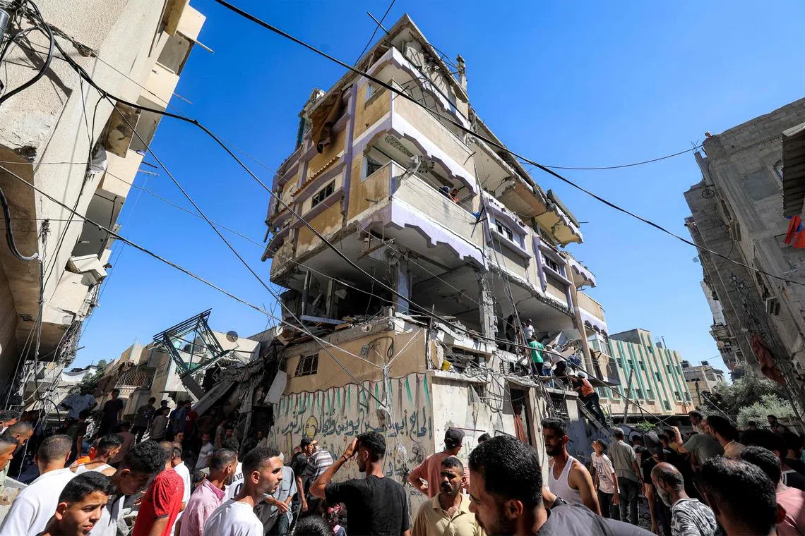 A building hit by Israeli bombardment in the Nuseirat camp for Palestinian refugees in the central Gaza Strip on July 6.