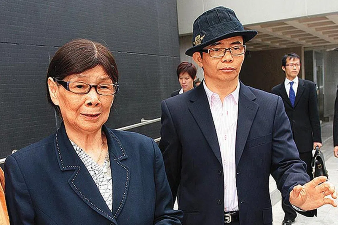 Tam Mei Kam, the mother of Hong Kong pop diva Anita Mui, with her elder son Mui Kai Ming in 2008.