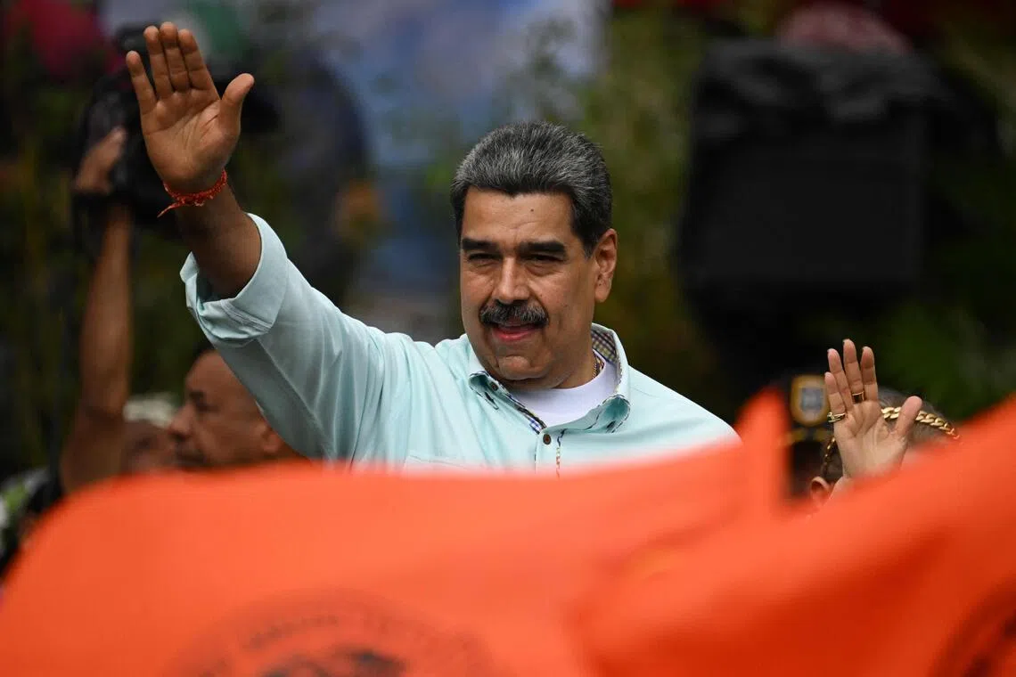 Venezuelan President Nicolas Maduro gestures during a rally in Caracas on Dec 10.