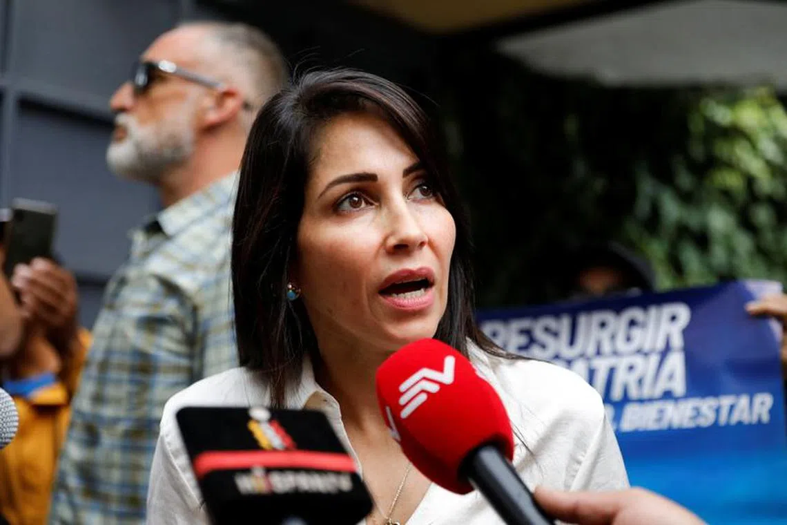 FILE PHOTO: Ecuadorian presidential candidate Luisa Gonzalez speaks to the media outside a local radio station after coming top in a first round of voting for Ecuador's presidency, in Quito, Ecuador August 21, 2023. REUTERS/Karen Toro