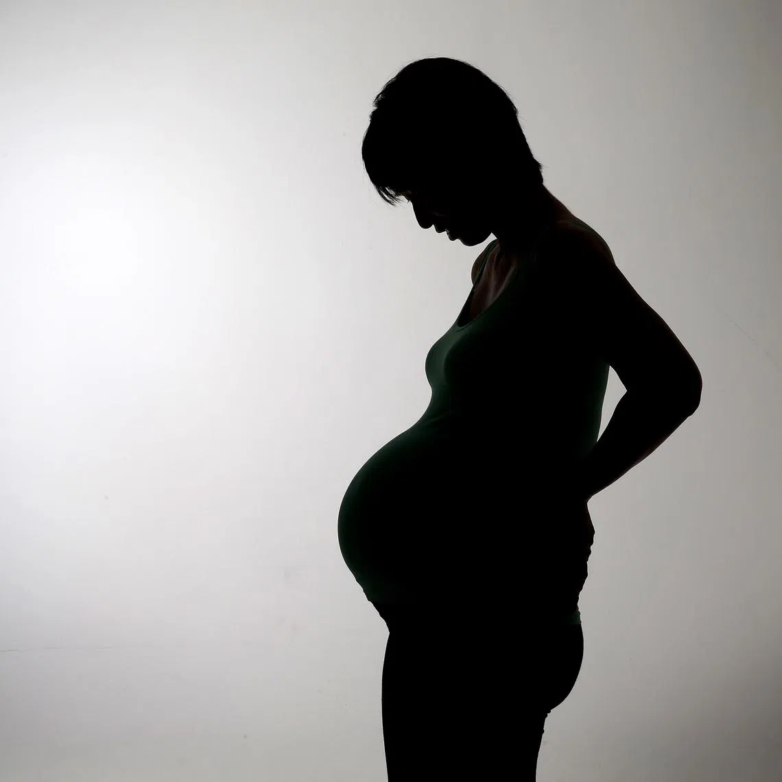 Posed photo of a pregnant woman. 