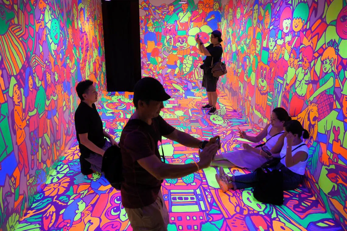 The Singapore Night Festival returns for its 15th edition this year. One of its highlights is the installation by Rizman Putra (above) called The Happiest Days of our Lives at Stamford Arts Centre.