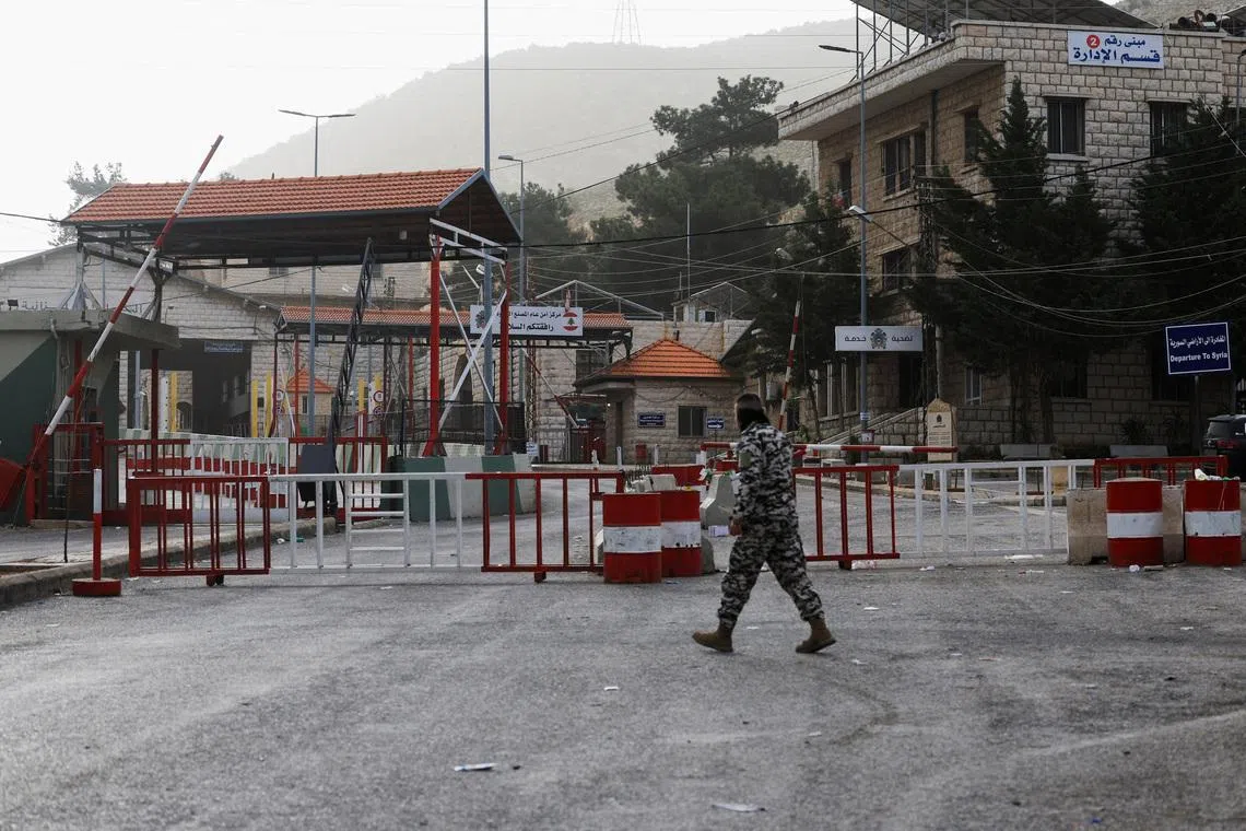 A man walks near the closed Lebanese-Syrian border checkpoint amid escalating hostilities between Israel and Hezbollah, as the U.S.-Israel conflict with Iran continues, near Masnaa, Lebanon, April 5, 2026. REUTERS/Mohamed Azakir