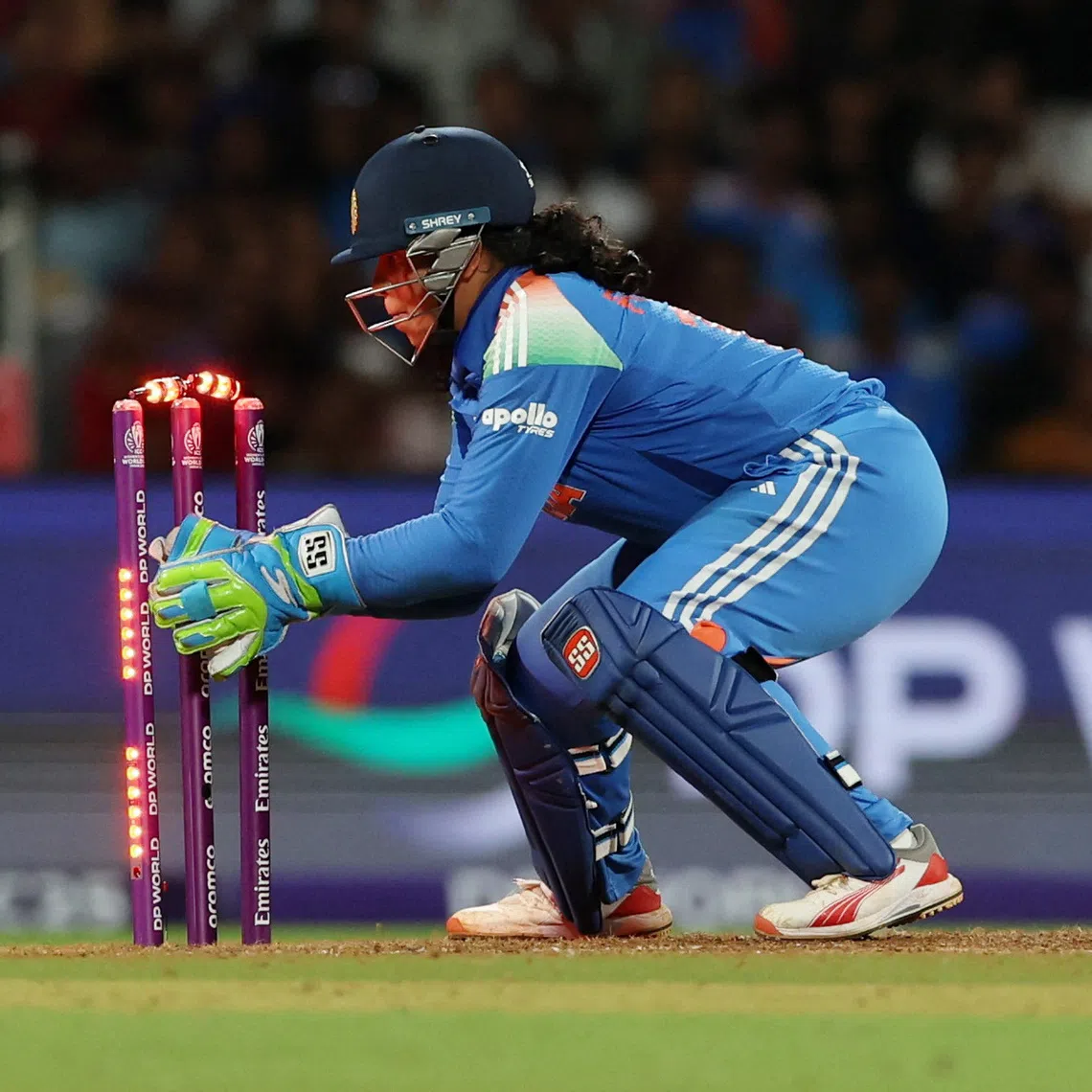 Cricket - ICC Women's World Cup - Final - India v South Africa - DY Patil Stadium, Navi Mumbai, India - November 2, 2025 India's Richa Ghosh runs out Ayabonga Khaka REUTERS/Francis Mascarenhas