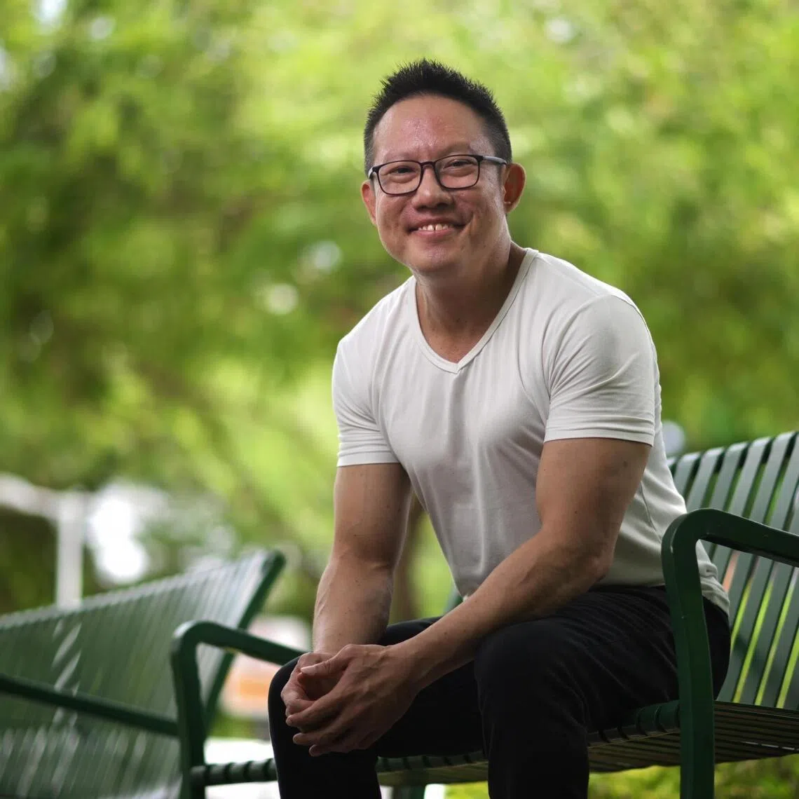 Portrait of Roger Tan, 48, who was diagnosed with incurable liver cancer in late 2024 and given less than 12 months to live, taken on June 4, 2025. He also distributed lunch with former inmates and volunteers to the elderly at THK Active Aging Centre at Cassia Crescent.