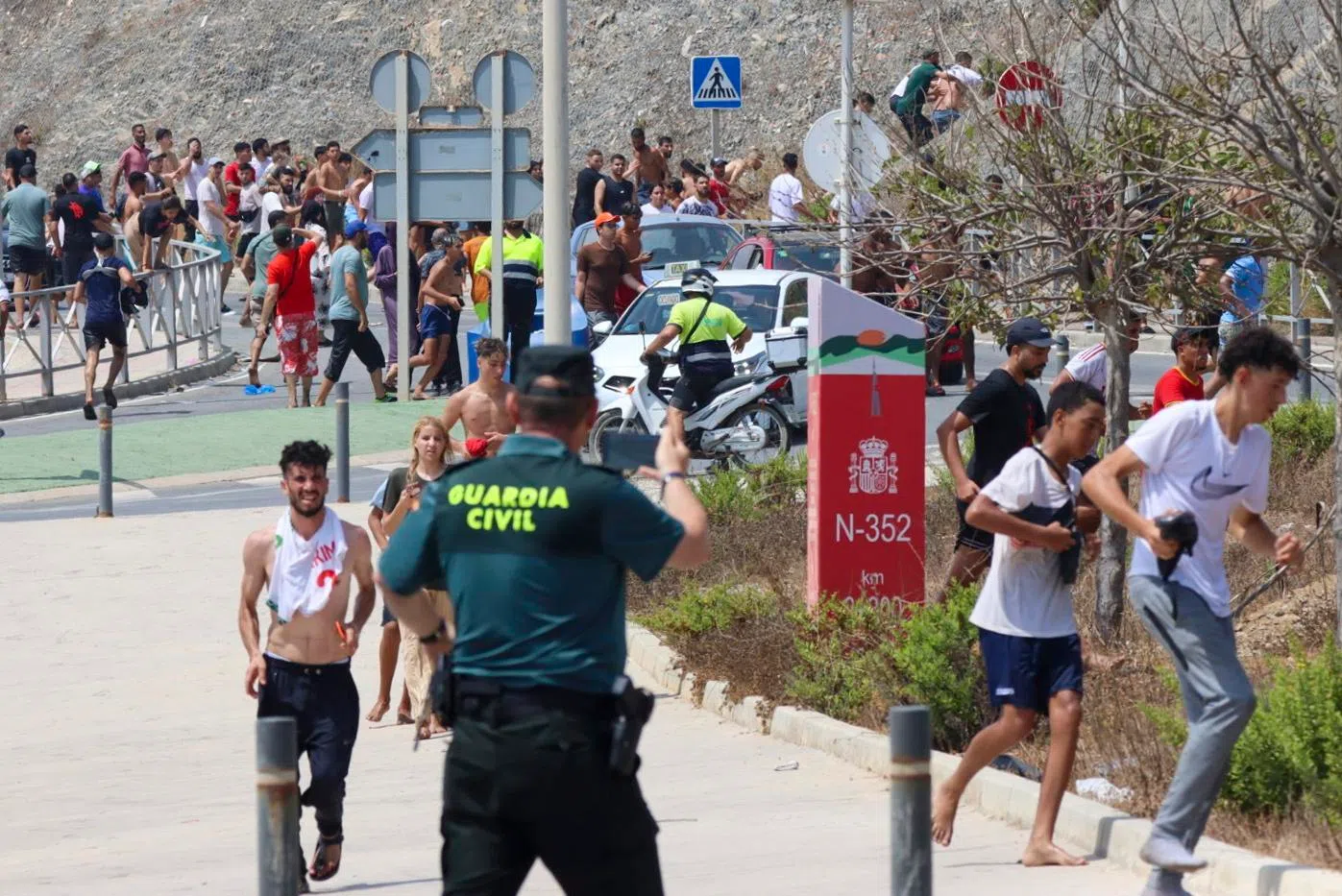 Guardia Civil officers were overwhelmed by the number of migrants entering Ceuta, a Spanish enclave in North Africa.