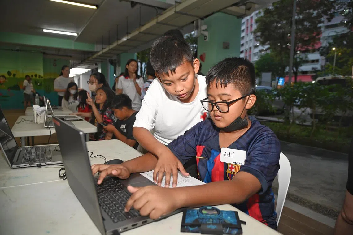 Far left : Mohamad Riyaz Rifky Bin Mohd Razey, 13, Yio Chu Kang Secondary School teaches coding to Adil  Rahil Bin Mohamad Rammy ,11.
He is a volunteer of the Void Deck Technology Lab programme at Yishun which is organised by community ground-up BYTE.sg and Singapore Red Cross.

President Halimah Yacob will visit BYTE.sg, a community ground-up, nonprofit initiative dedicated to bridging and empowering lives through science, technology, and design. 

During the visit, President Halimah will be briefed on BYTE.sg’s work and the Void Deck Technology Lab (VDTL) programme, as well as the collaboration with SRC. President Halimah will also observe a few VDTL activities and interact with the beneficiaries and volunteers.