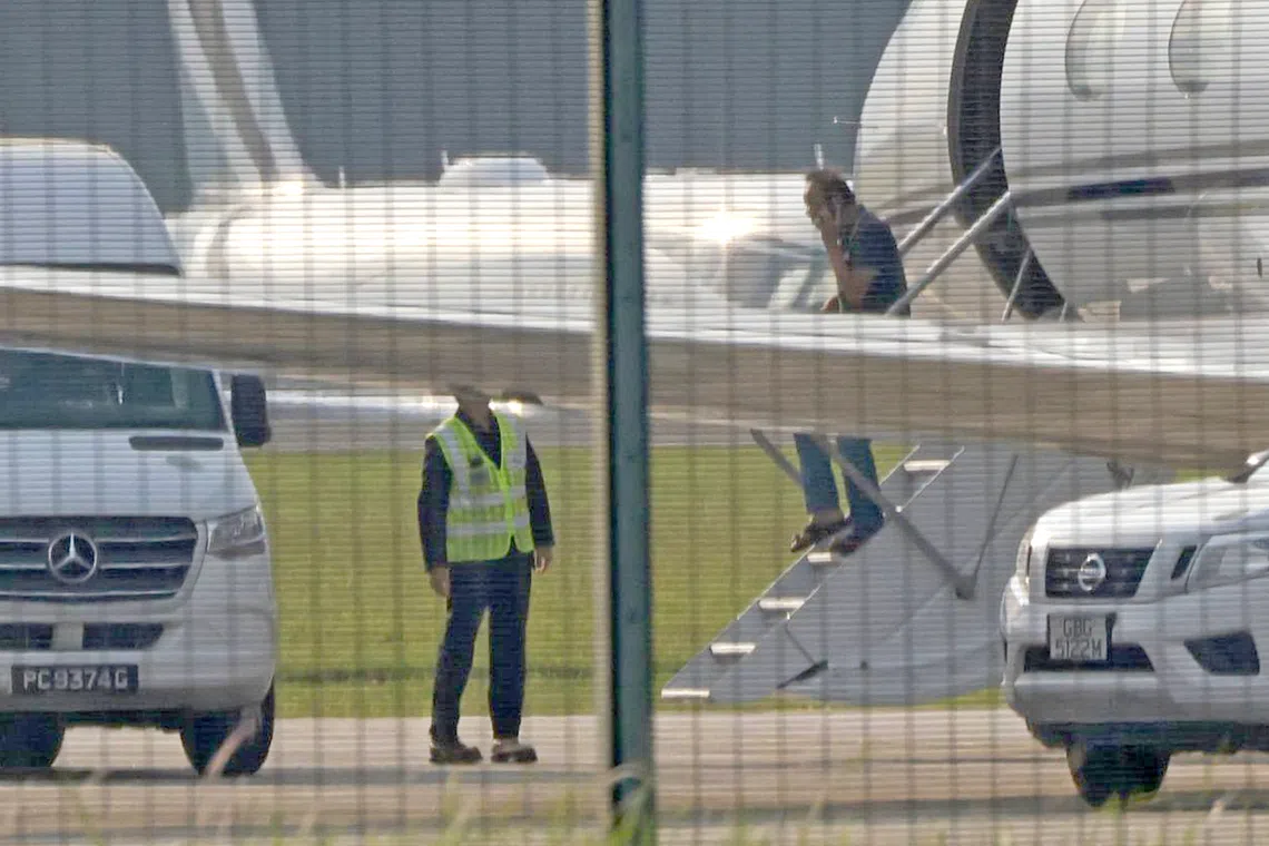 Mr Ong Beng Seng’s private jet landed in Seletar airport at about 5.15pm. He was ushered into a black Audi sedan with his wife.