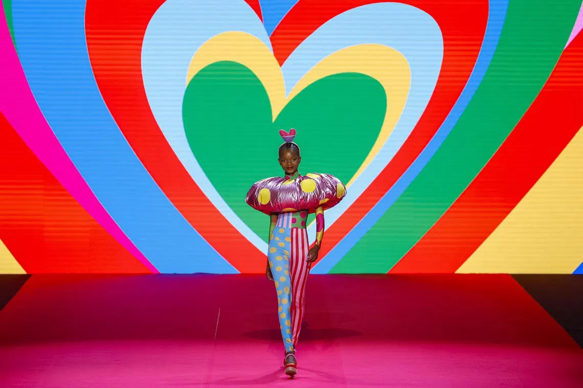 A model presenting a creation by Spanish designer Agatha Ruiz de la Prada at the Mercedes-Benz Fashion Week Madrid, in Madrid, Spain, Sept 14.