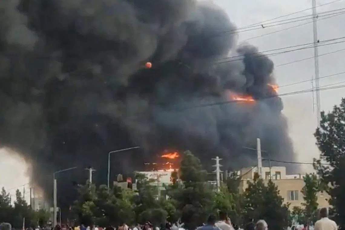 Ten hurt in fire at shopping centre west of Tehran, Iranian media says