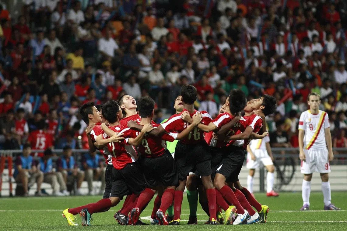 The Singapore players cheers ahead of the Singapore versus Montenegro boys' preliminary football match of the Singapore 2010 Youth Olympic Games (YOG) played at the Jalan Besar Stadium, Aug 19, 2010. Photo: SPH-SYOGOC/Kevin Lim