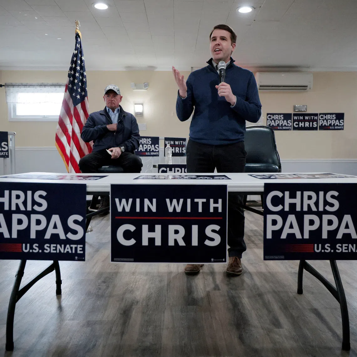 FILE PHOTO: U.S. Representative and Democratic candidate for the U.S. Senate Chris Pappas is joined by U.S. Senator Mark Kelly while campaigning at the VFW Post in Derry, New Hampshire, U.S., March 20, 2026.   REUTERS/Brian Snyder/File Photo