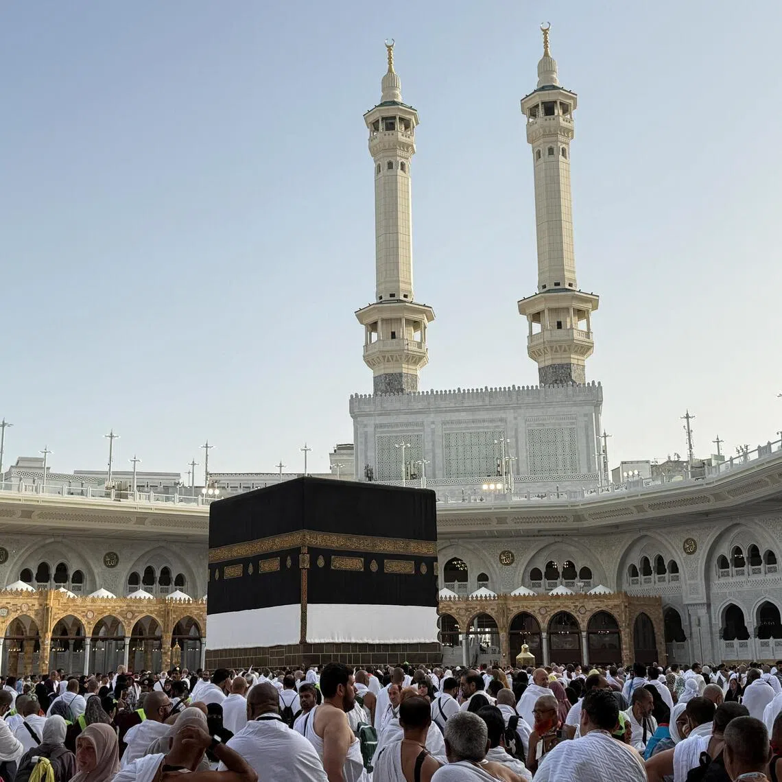 Muslim pilgrims circle the Kaaba and pray at the Grand Mosque, ahead of the annual haj pilgrimage, in Mecca, Saudi Arabia.